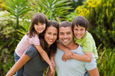 Family discussing life insurance options in Palm Desert, CA